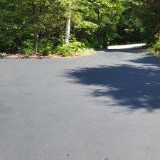 Driveway sealer installation complete on home remodel project
