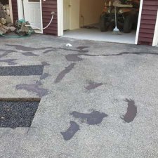 Driveway patching and prep work done before sealer application